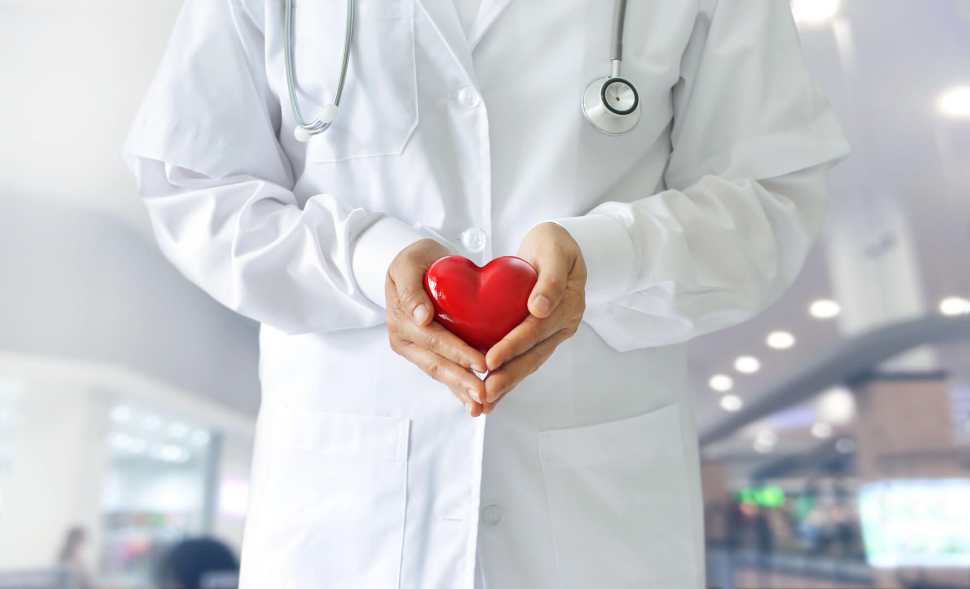 medicine-doctor-holding-red-heart-shape-hands-medical-techno-scaled
